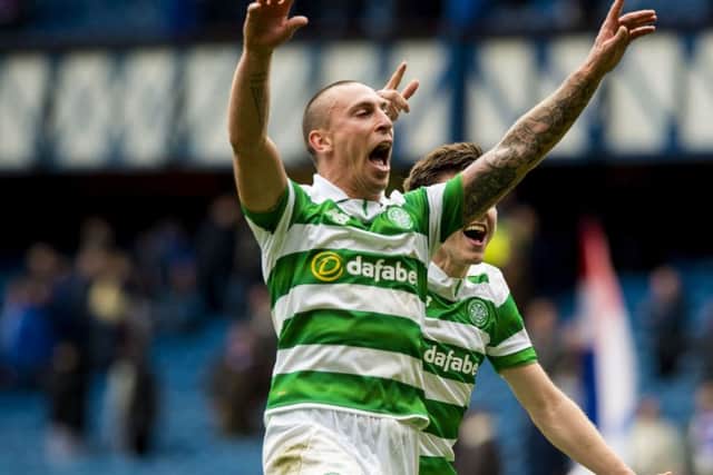 Scott Brown celebrates Celtic's 5-1 win over Rangers at Ibrox last month.