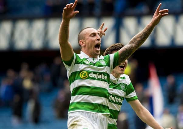 Scott Brown celebrates Celtic's 5-1 win over Rangers at Ibrox last month.