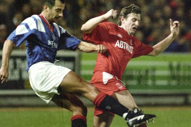 Paul Mason and Dale Gordon battle it out at Ibrox in 1993. Picture: SNS.