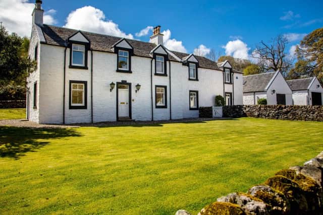 Rhubodach is a whitewashed farmhouse and cottage set in 56 acres of land on the north-east coast of Bute.