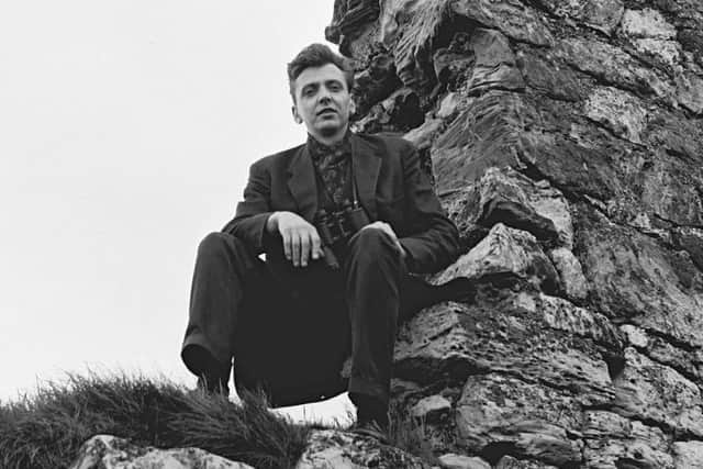 Ian Brady pictured sitting on a wall on Saddleworth Moor. Picture: SWNS