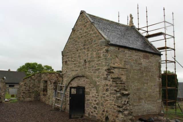 The mausoleum at the Old Parish Church at Kinfauns. The new unicorn can be seen in position top right. PIC: Historic Environment Scotland.