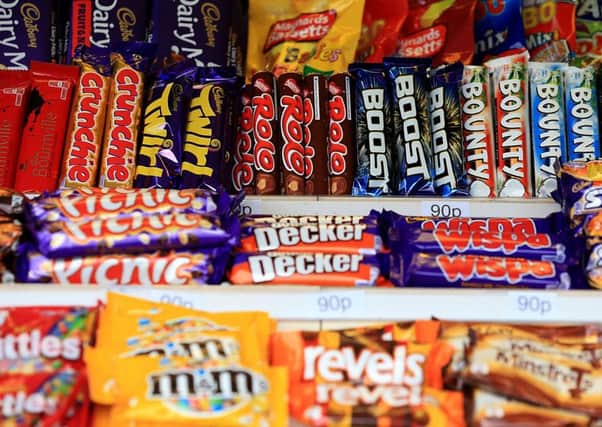 Young Scots are eating more sweets than their UK counterparts, but drinking less fizzy juice than they did 15 years ago. Picture: PA
