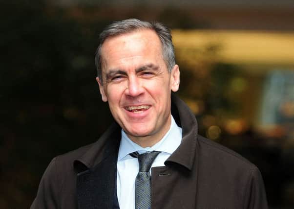 Mark Carney and his Bank of England colleagues are unlikely to respond to soaring inflation by hiking interest rates, writes Martin Flanagan. Picture: Ian Rutherford