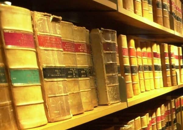 Could artificial intelligence have a place alongside the law books? Picture: Robert Perry