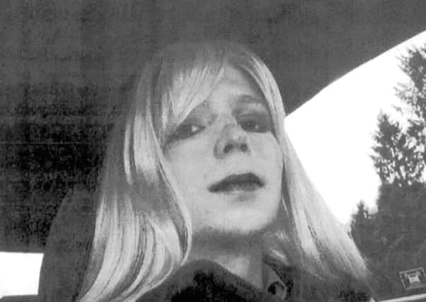 Undated file photo of then Bradley Manning in wig and make-up. Chelsea Manning was released from prison today.