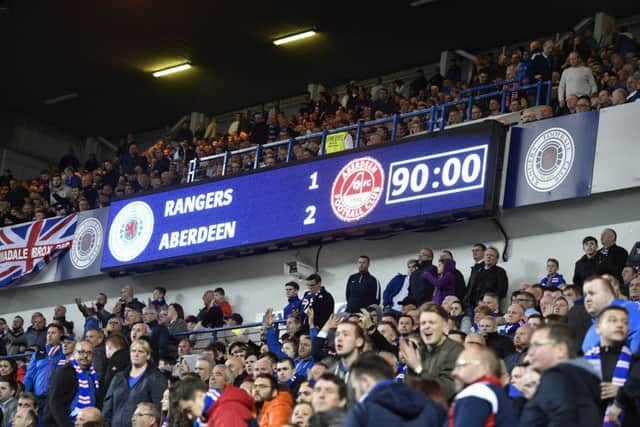 Aberdeen won against Rangers at Ibrox for the first time since 1991. One Rangers fan took excepetion and stole the match ball. Pic: SNS/Rob Casey