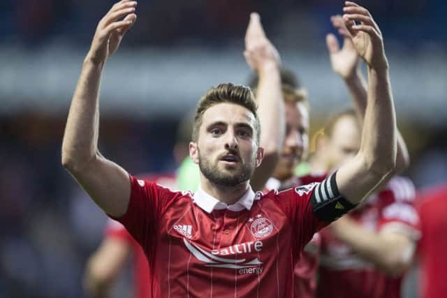 Aberdeen's Graeme Shinnie celebrates his goal against Rangers at Ibrox. Picture: Jeff Holmes/PA Wire
