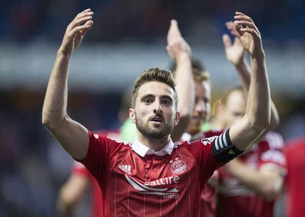Aberdeen's Graeme Shinnie celebrates his goal against Rangers at Ibrox. Picture: Jeff Holmes/PA Wire