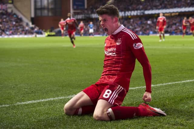 Ryan Christie celebrates what proved to be the winning goal. Pic SNS/Craig Williamson