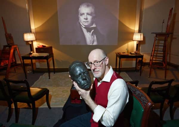 Professor Richard Wiseman with the death mask of Sir Walter Scott which will be a key part of the seances to be held in the Signet Library. Picture: Neil Hanna
