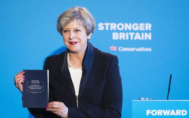 Theresa May launches her manifesto, which aims to snare middle-ground Labour voters.