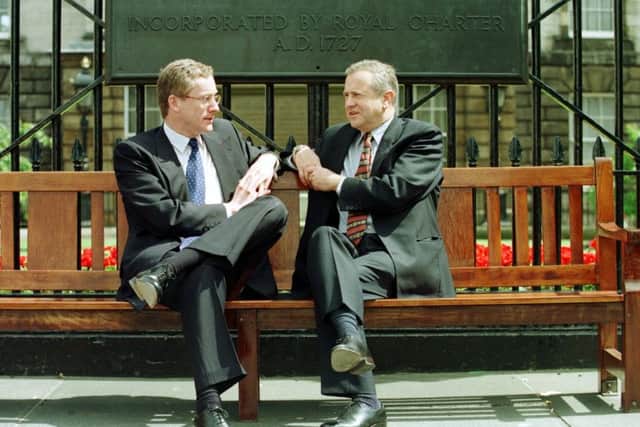 Fred Goodwin (left) chatting to George Mathewson, former RBS group chief executive, in 1998. Picture: contributed