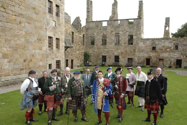The Circle of Gentlemen in 2009 at a meeting at Balgonie Castle in Fife. Matthew Donnachie, circle commander, is pictured front centre in blue. PIC Robert Perry/TSPL.