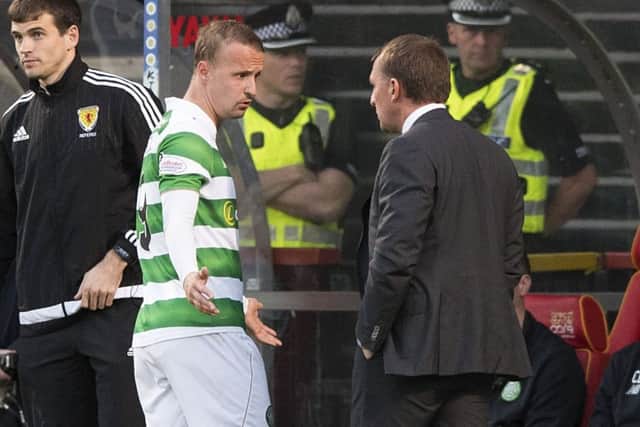 Leigh Griffiths exchanges words with manager Brendan Rodgers after being substituted. Pic: SNS/Alan Harvey