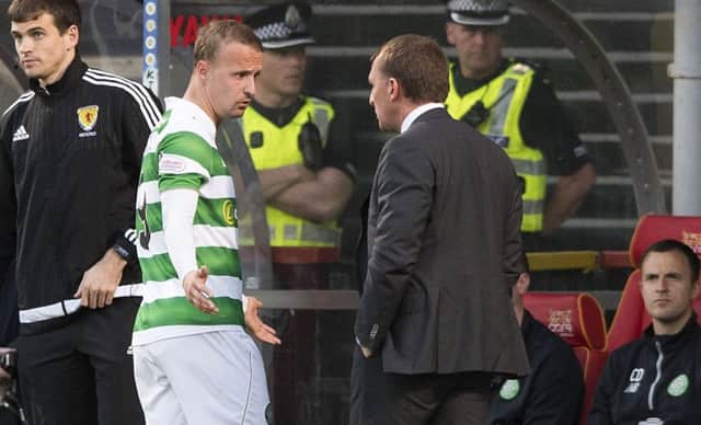 Leigh Griffiths exchanges words with manager Brendan Rodgers after being substituted. Pic: SNS/Alan Harvey
