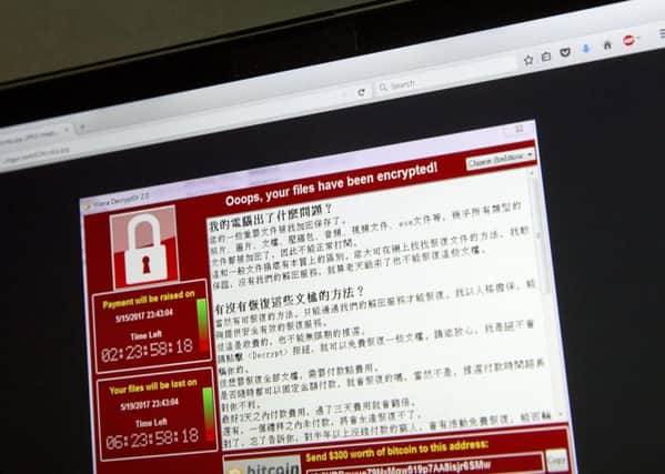 Pinsent Masons partner Iain Birdsey urges firms to put in place, and test, response plans to deal with cyber risks like the WannaCry attack. Picture: Mark Schiefelbein/AP