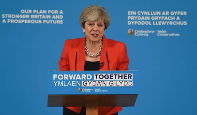 Britain's Prime Minister Theresa May speaks during a launch event for the Welsh Conservative general election manifesto in Wales. Pic: AFP/Getty Images