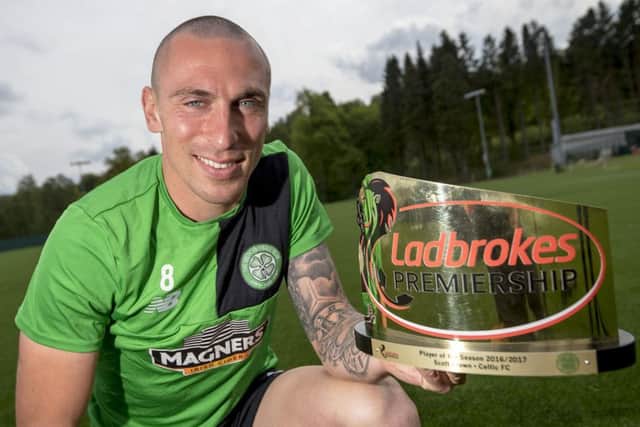 Scott Brown is presented with the Ladbrokes Manager of the Season award. Pic: SNS/Bill Murray