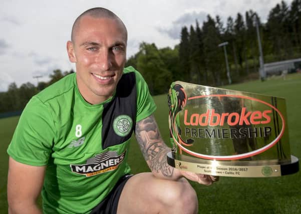 Scott Brown is presented with the Ladbrokes Manager of the Season award. Pic: SNS/Bill Murray
