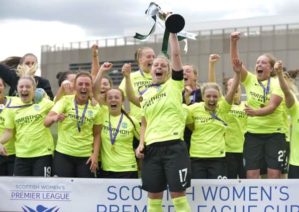 Captain Joelle Murray raises the SWPL Cup after Hibernian Womens 4-1 win in the final. Picture: Lorraine Hll.