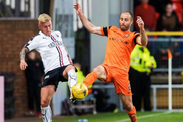 16/05/17 LADBROKES PREMIERSHIP PLAY OFF SEMI-FINAL 1ST LEG
 DUNDEE UNITED v FALKIRK (2-2)
 TANNADICE - DUNDEE
 Dundee United's Sean Dillon (R) in action with Falkirk's Craig Sibbald.