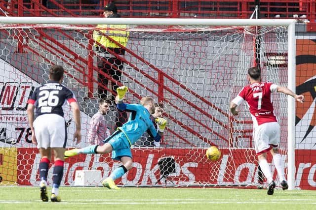 Dougie Imrie scores from the spot to give Hamilton a 3-0 lead. Pic: SNS/Alan Harvey