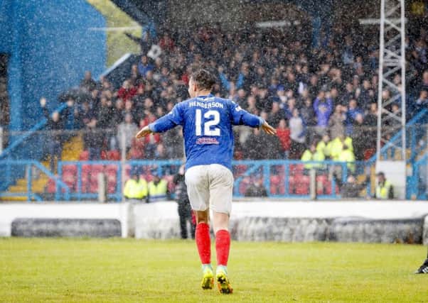Cowdenbeath's Liam Henderson celebrates the winning penalty to keep the club in the SPFL. Pic: SNS/Roddy Scott
