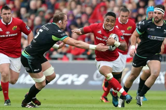 Munster's Francis Saili tries to evade  Ospreys' Alun Wyn Jones (centre left) during the Guinness PRO12 Semi final match at Thomond Park.  Picture: Niall Carson/PA Wire.