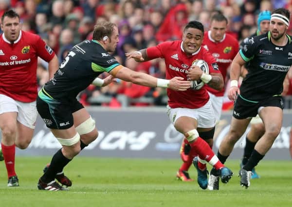 Munster's Francis Saili tries to evade  Ospreys' Alun Wyn Jones (centre left) during the Guinness PRO12 Semi final match at Thomond Park.  Picture: Niall Carson/PA Wire.