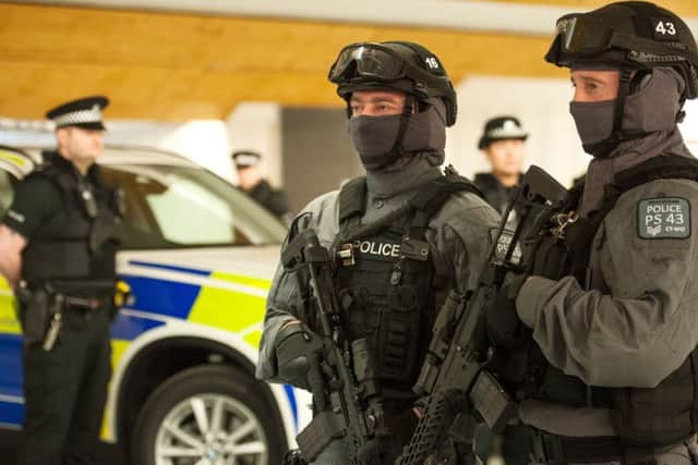 Armed police will be deployed at transport hubs. Picture: John Devlin