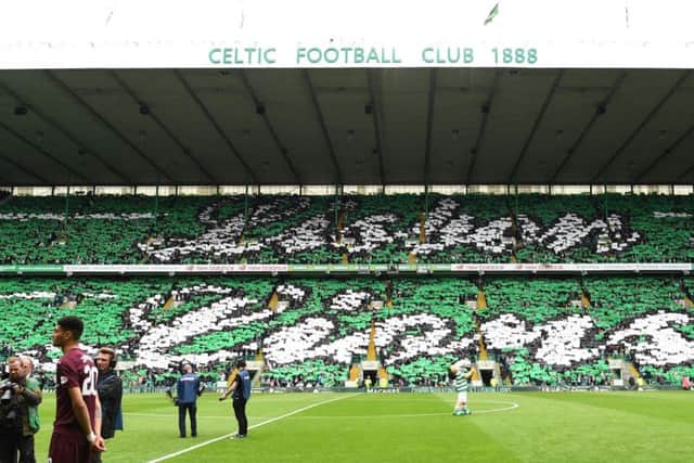 Celtic fans come together to display 'Lisbon Lions' in the stands. Picture: PA