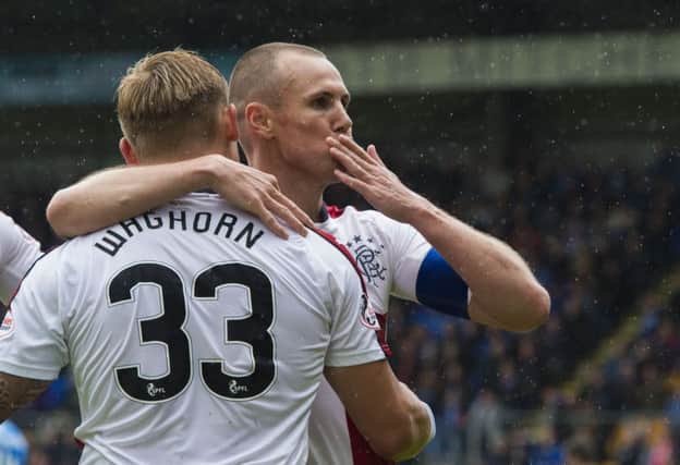 Kenny Miller celebrates his goal alongside Martyn Waghorn. Picture: SNS