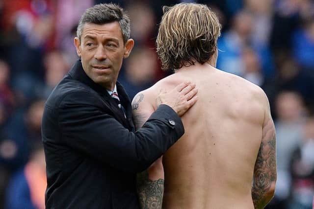 Rangers manager Pedro Caixinha congratulates his players after victory over St Johnstone. Picture: PA