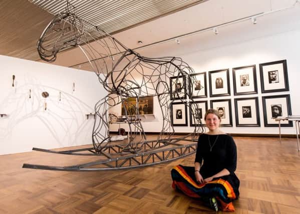 Ulrika Kjeldsen with her Clydesdale horse on rockers