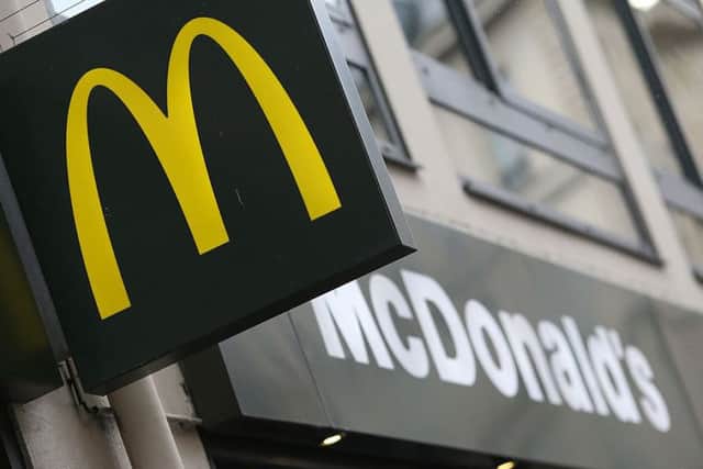 Michael and Ross Dunlop signed in a local McDonald's. Picture: AFP/Getty