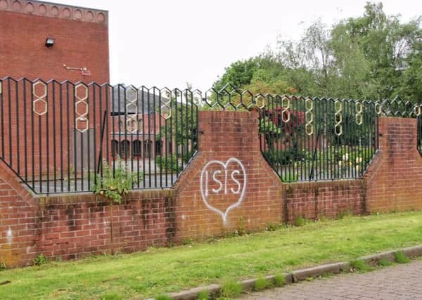 The graffiti outside the mosque. Picture: Alisdair Woodburn/Twitter