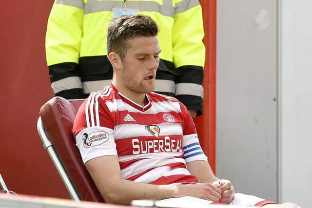 Michael Devlin left Hamilton's match with Dundee last Saturday on a stretcher. Picture: SNS