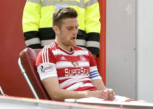 Michael Devlin left Hamilton's match with Dundee last Saturday on a stretcher. Picture: SNS