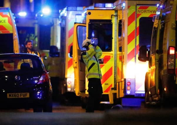 Swarms of emergency services at Manchesters MEN Arena. Picture: SWNS