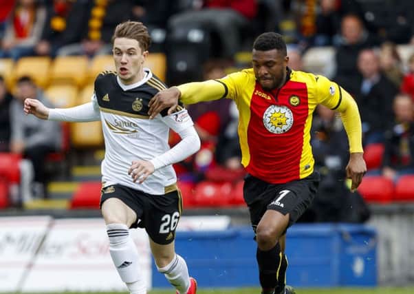 David Amoo, right, is one of five first-team players to exit Partick Thistle. Picture: SNS