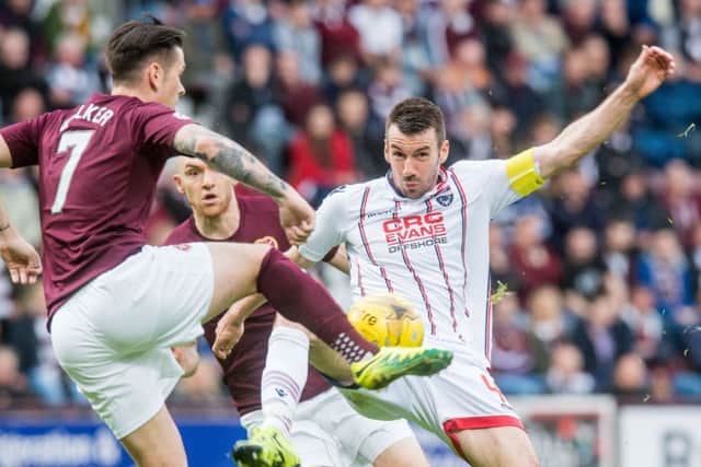 Paul Quinn, right, has been released by Ross County. Picture: Ian Georgeson