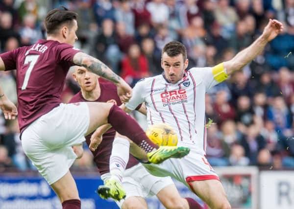 Paul Quinn, right, has been released by Ross County. Picture: Ian Georgeson