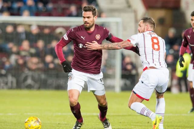 Alexandros Tziolis is among six players leaving Tynecastle. Picture: Ian Georgeson