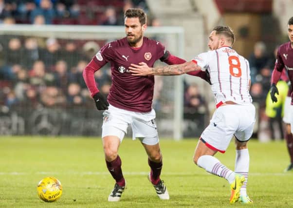 Alexandros Tziolis is among six players leaving Tynecastle. Picture: Ian Georgeson