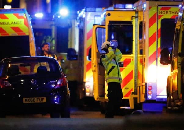 Swarms of emergency services at Manchesters MEN Arena. Picture: SWNS