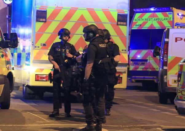 Armed police at Manchester Arena. Picture: PA