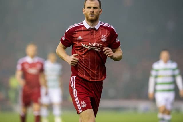 Defender Mark Reynolds wants to have last laugh on mockers in the Aberdeen dressing room. Picture: SNS.