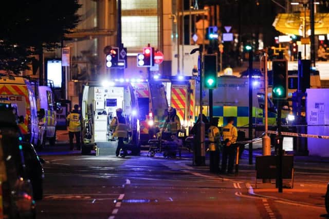 Swarms of emergency services at Manchesters MEN Arena and Piccadilly Station after an explosion