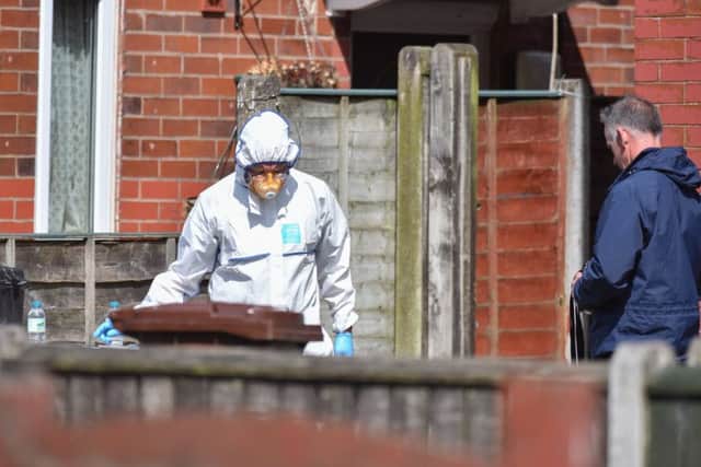 Police and forensics at a property on Elsmore Road in the Fallowfield area of Manchester. Picture SWNS